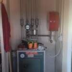 Før billede af det gamle oliefyr