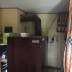 Det gamle oliefyr som nu er udskiftet til en ny varmepumpe.